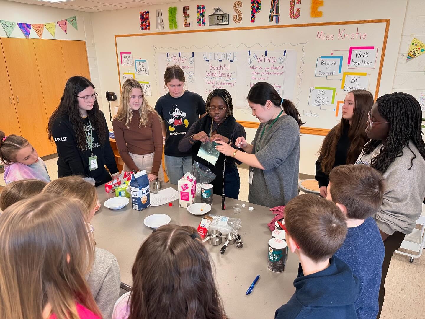 Engineering Club members demonstrating the power of STEM to third graders. 