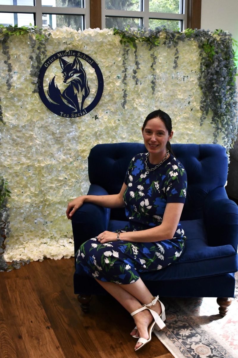 Mrs. Grier poses at the tea party that she is helping to establish as a new tradition.