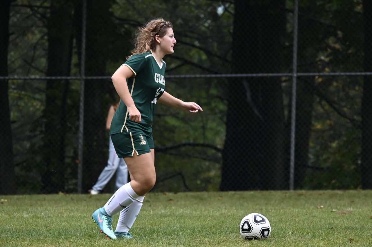 Jojo Coker '26 making her way down the field.