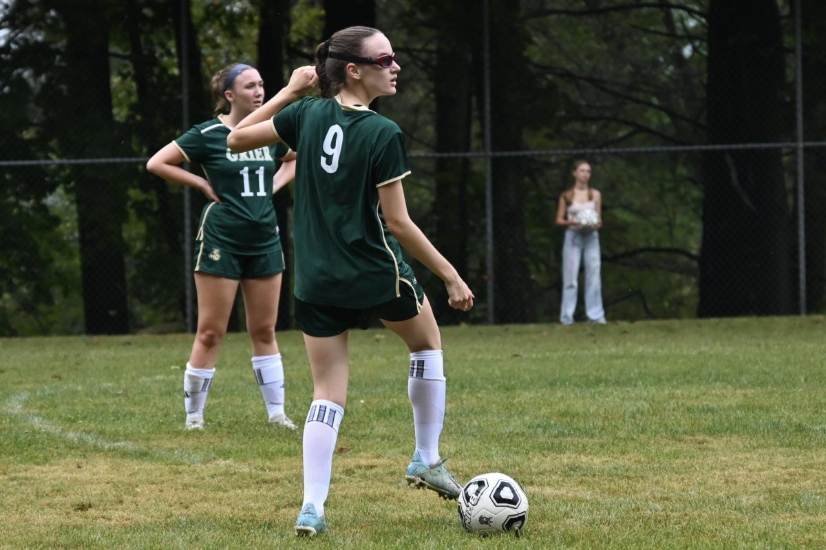 Natalie Kelsey, '26 maneuvers the ball with skill.