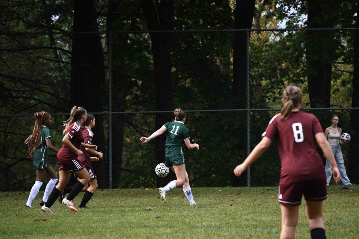 Angelena Mack, '27 chases after a ball.
