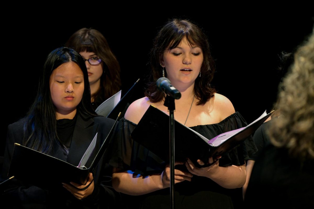 Rayna Qu and Emma Ellenberger singing at the Parents weekend concert