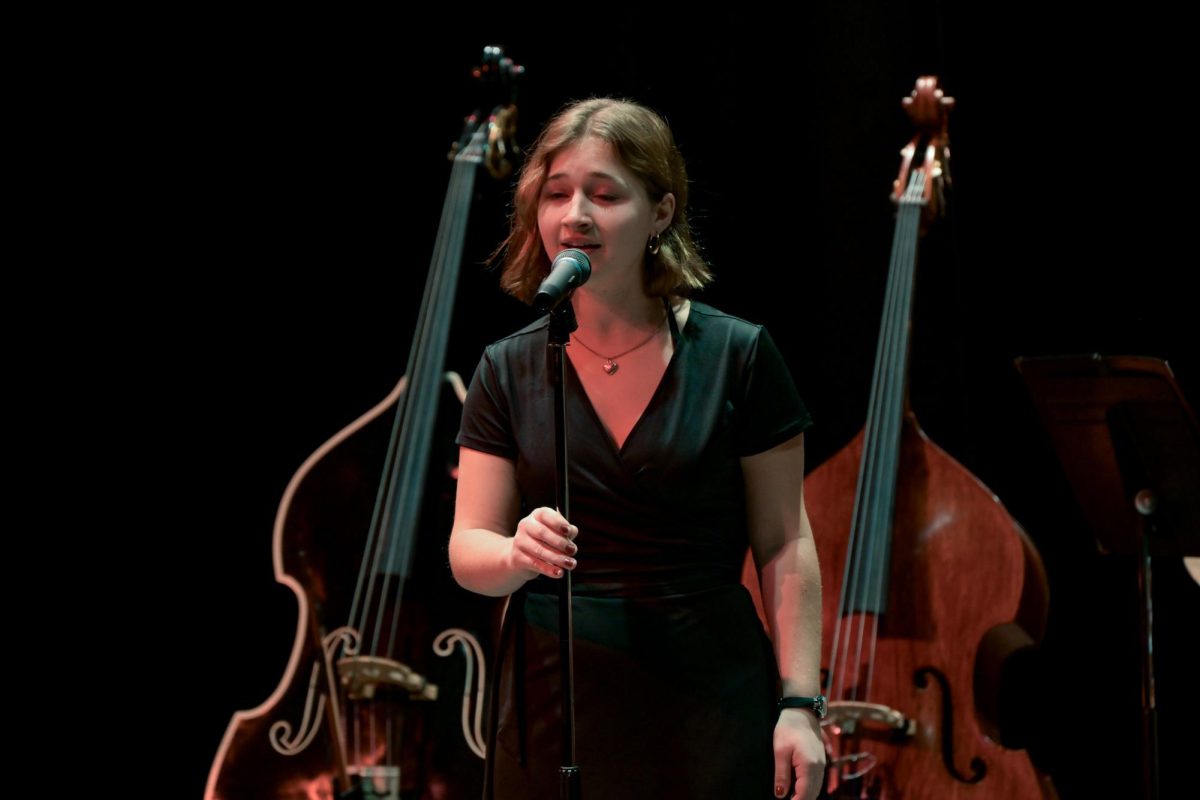 Addie Yoder singing at the Parents weekend concert