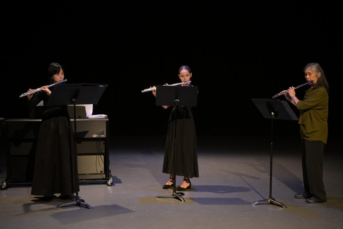 Grier girls playing the flute at the Parents weekend concert