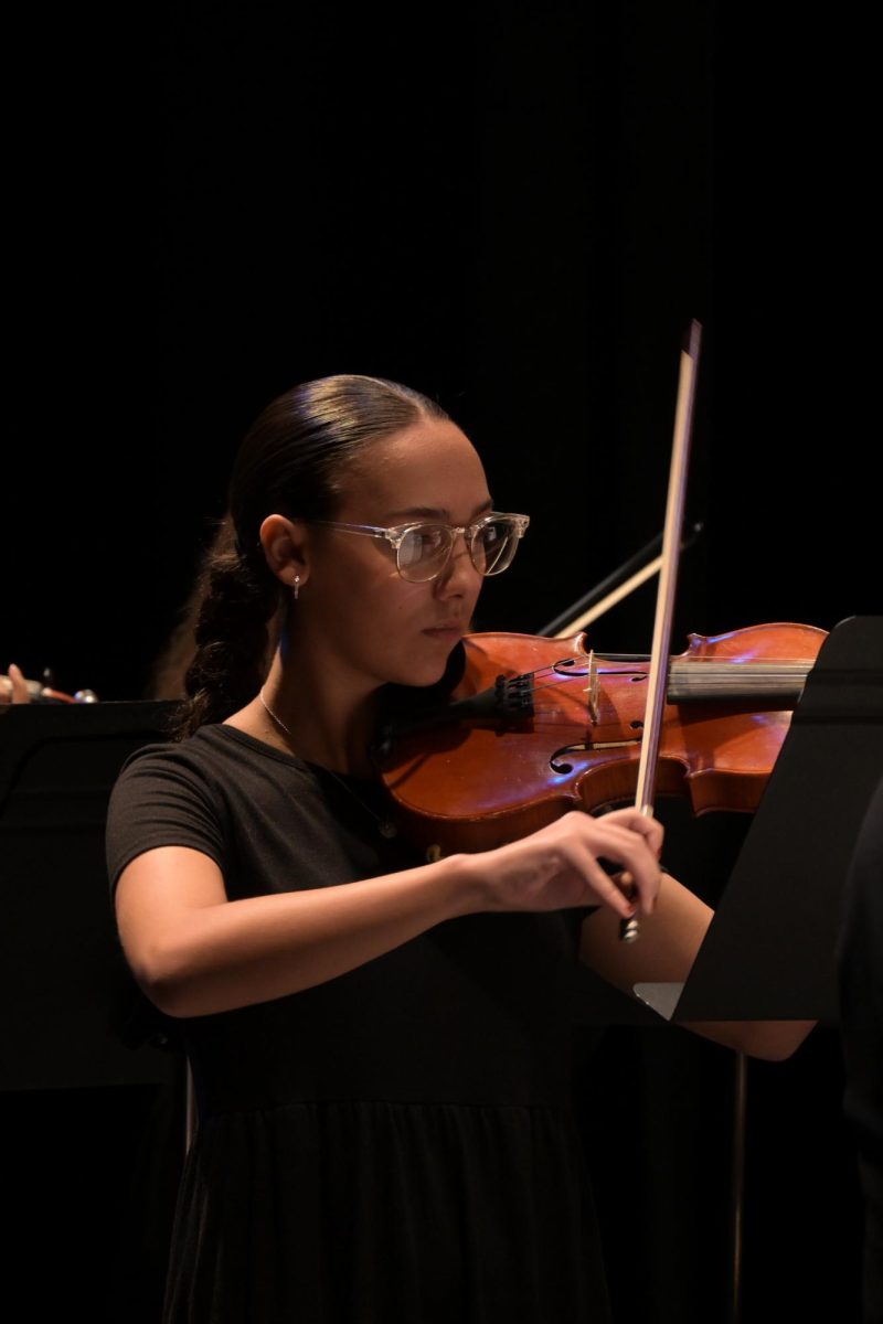 Sydney Cicero playing at the parents weekend concert